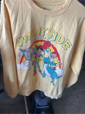 Disney Pixar Sunnyside Yellow women Sweatshirt with Toy Story Graphic